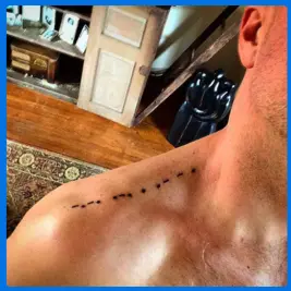 tattoo in guys shoulder